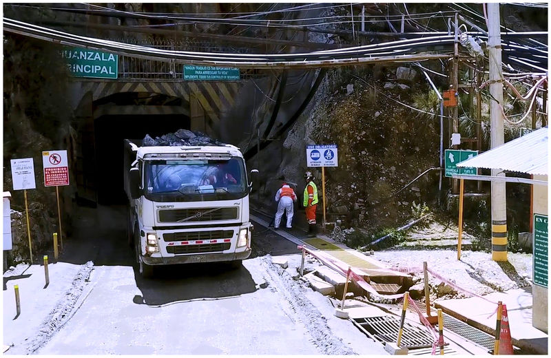 15 - TRUCK LOADED WITH ORE LEAVING MINE PORTAL.jpg