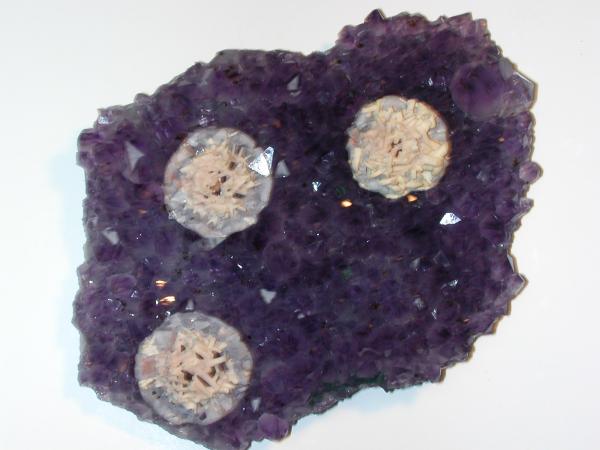 Amethyst buttons after trimming.JPG