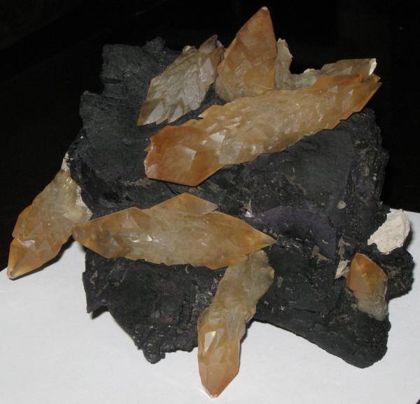 Calcite on fluorite shards.jpg