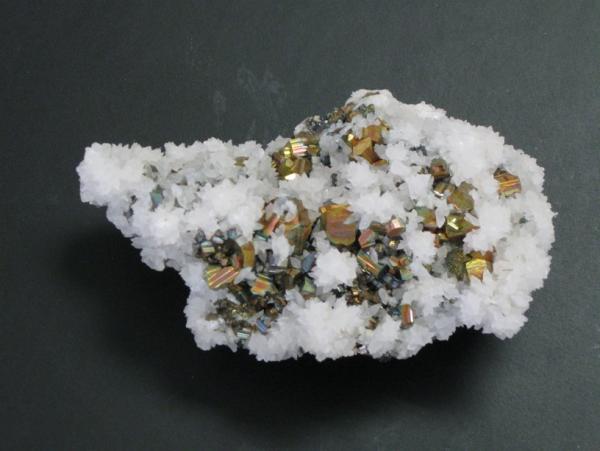 Iridescent pyrite on calcite.jpg