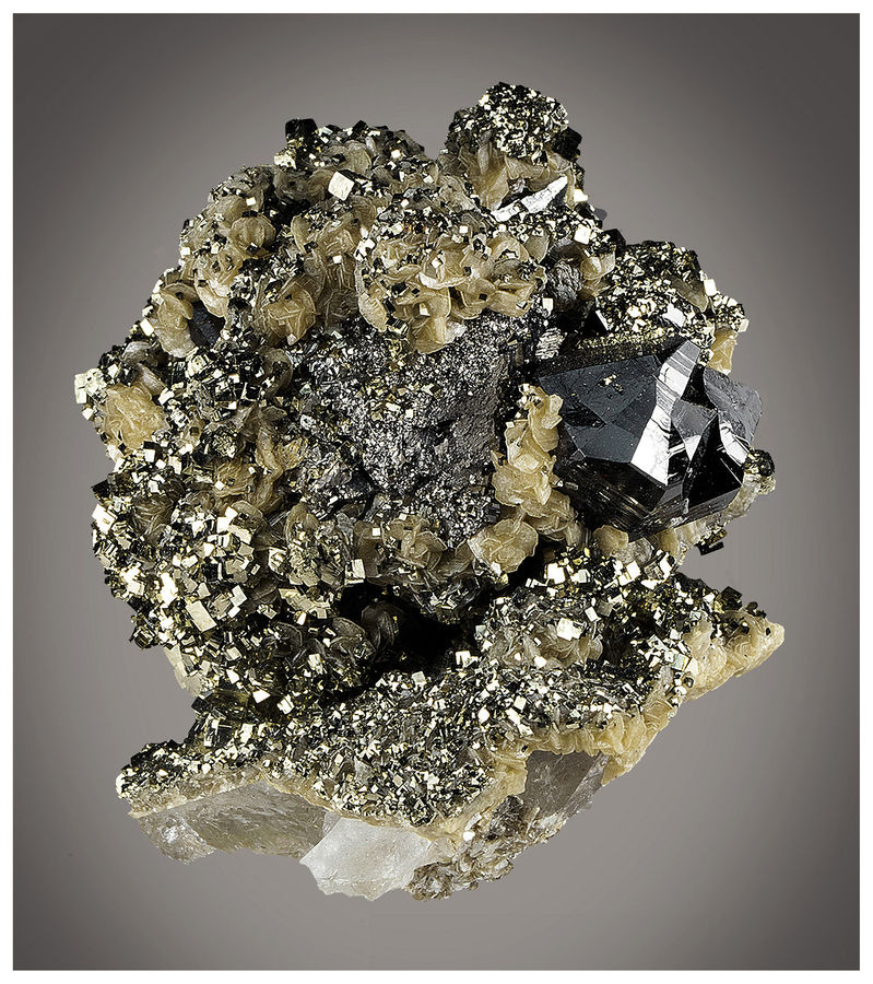 01 - CASSITERITE WITH PYRITE AND MUSCOVITE.jpg