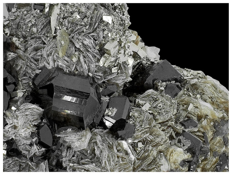 04 - CASSITERITE WITH PYRITE ON QUARTZ.jpg