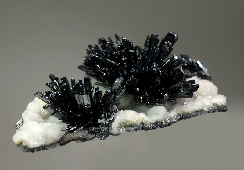 2472 Stibnite on calcite - Herja Mine, Romania.jpg