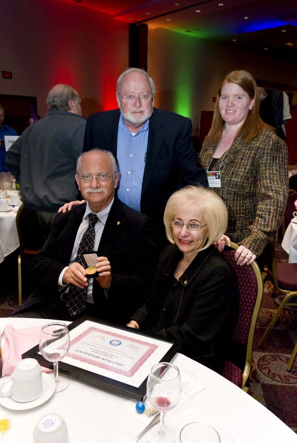 Bill Pinch and KIm Tait & Renato Pagano with the Pinch medal.jpg