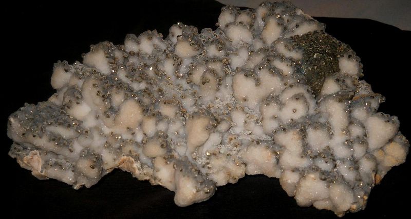Calcite with chalcopyrite - mine Gavra, Romania.jpg