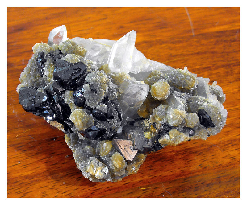 Cassiterite, Arsenopyrite, Muscovite withe Quartz 2.jpg