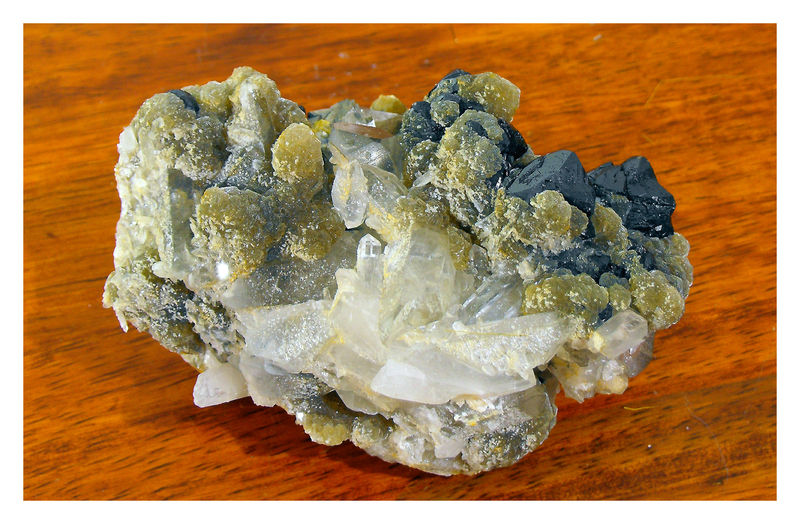 Cassiterite, Arsenopyrite, Muscovite withe Quartz 3.jpg
