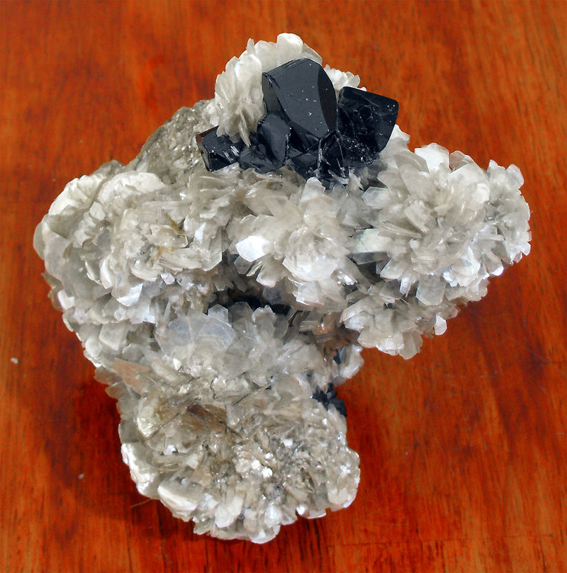 CASSITERITE WITH MUSCOVITE 2.jpg