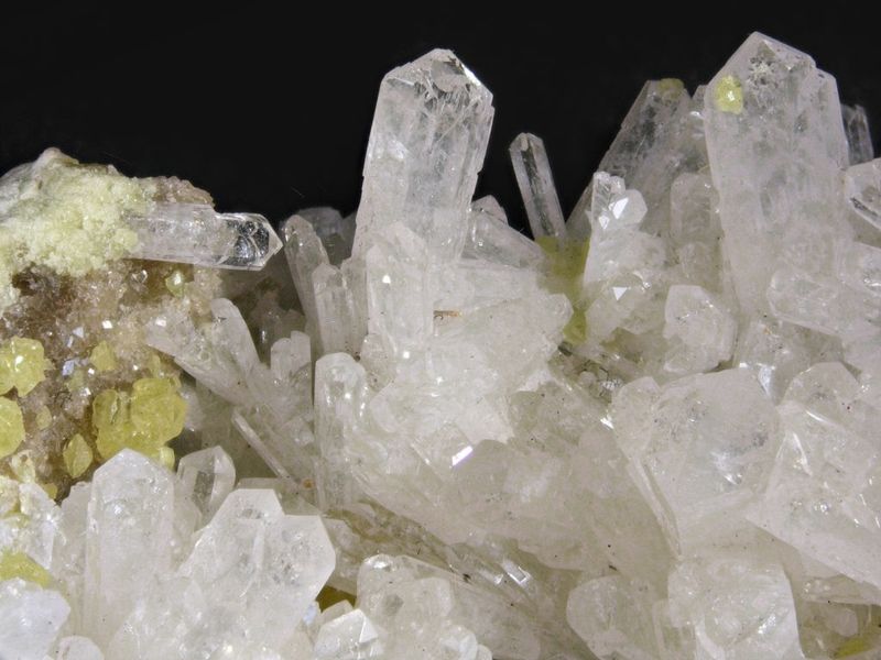 Celestite and sulfur. Machw, Poland. 3 cm FOV.jpg