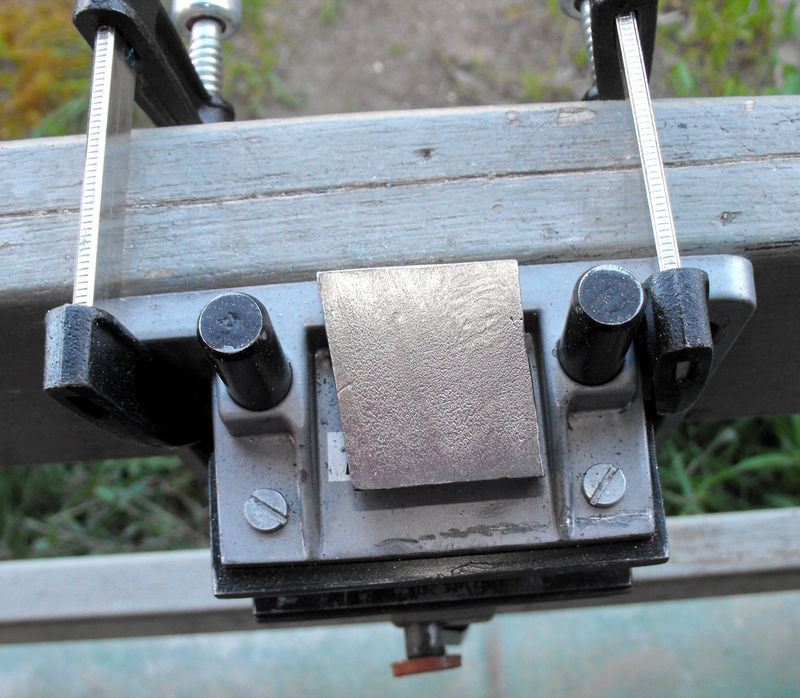 CUTTING BY HAND A YTTRIUM BLOCK 3.jpg.jpg