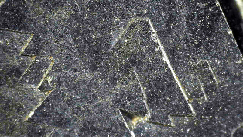 Magnetite pyramid surface features 1.jpg